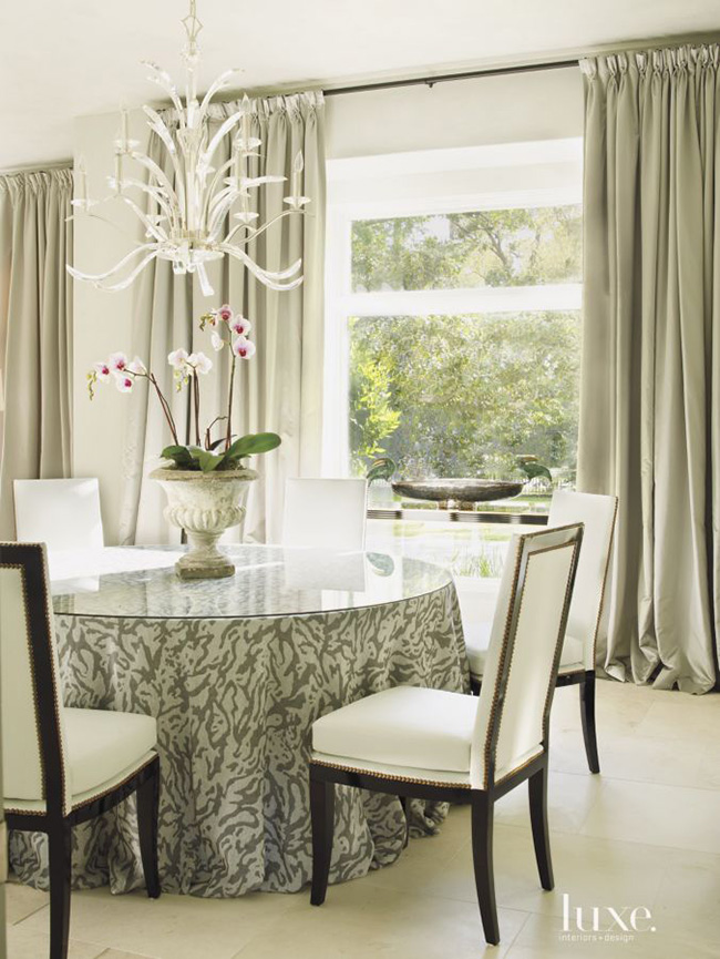 Segreto Secrets - Modern Meets French Country - Dining Room with Animal Print Skirted Table