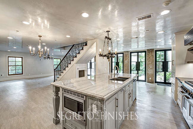 Segreto Secrets - Soft Gray Blue Island Finish in Plastered Kitchen