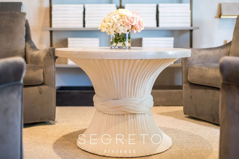 Segretostone coated side table with flowers