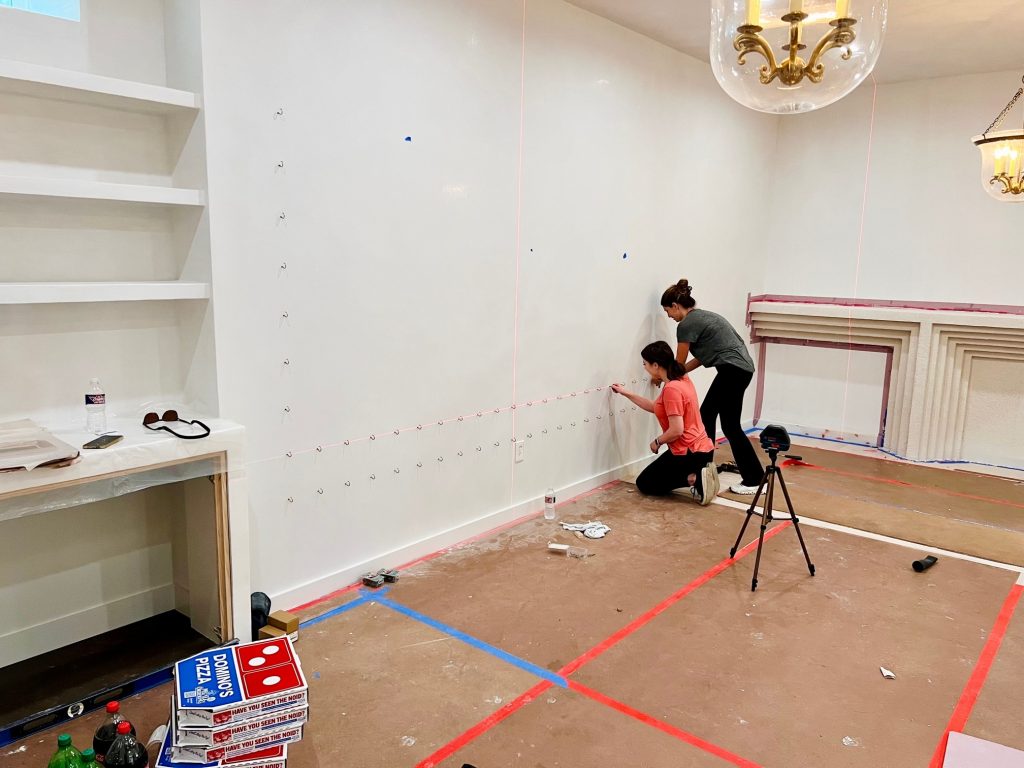 My daughters Kirby and Sammy hanging the hooks on our paint wall.