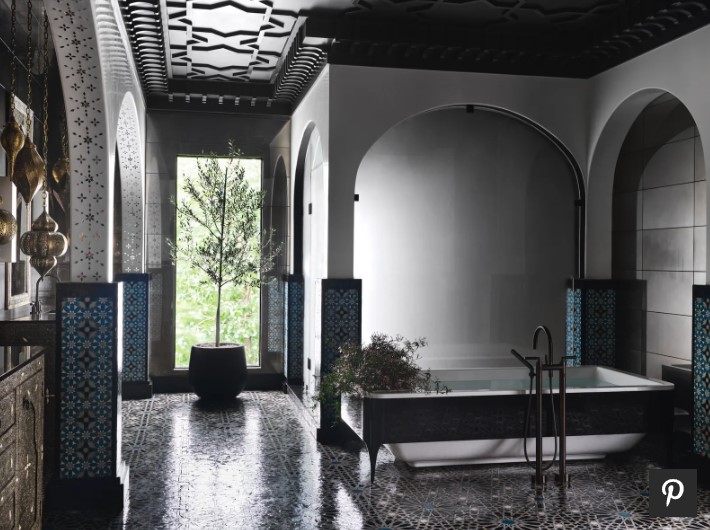 This is the master bathroom, with decorative mirrors in the ceiling and hand paint design